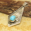 Navajo Anthony Bowman ロイストンTQ付き・トゥファキャストペンダントトップ画像