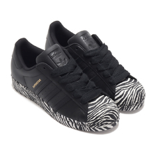 adidas SUPERSTAR W CORE BLACK/WHITEGOLD METARIC/FOOTWEAR WHITE FV3448画像